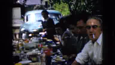 California USA (1969): Man Smoking Cigarette And Pointing At Camera With Glasses