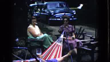 California USA (1969): Vintage Video Woman Sitting Outside Talking And Laying On A