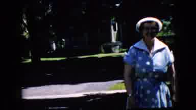 California USA (1969): Happy Old Lady Walking Towards Camera On A Beautiful Day