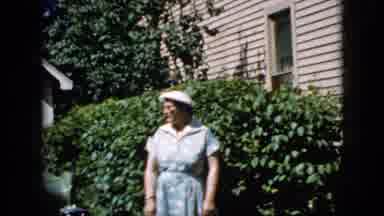 California USA (1969): Vintage Home Video Of Lady Standing In Yard Waving At The