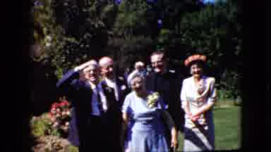 California USA (1969): Men And Women Stand Outside And Smile