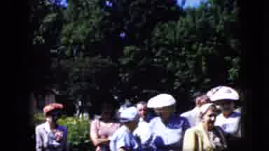 California USA (1969): Formally Dressed People At A Park