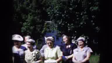 California USA (1969): Older Group Of People In A Garden
