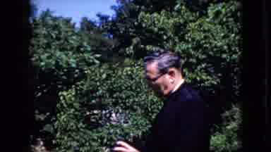 California USA (1969): Guy Standing By Trees
