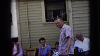 California USA (1969): At An Outdoor Family Gathering A Father Proudly Brings His