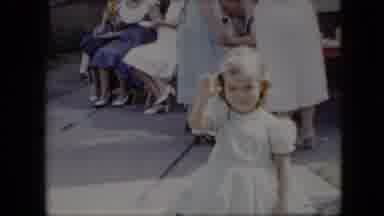 California USA (1969): Baby Girl Waves Hi To The Camera