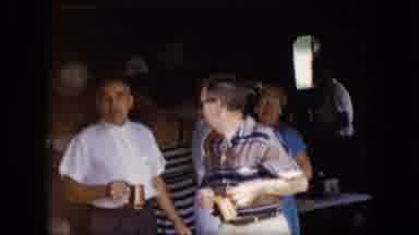 California USA (1969): Family Gathering Outdoors In Front Of The Garage