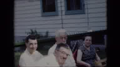 California USA (1969): Smoking Outside Men