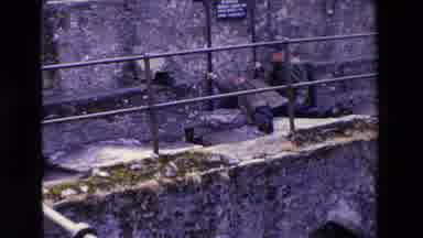 Ireland (1969): A Man Helping Another Sit Back Up