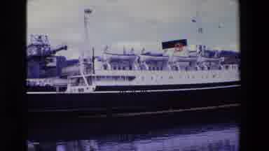 Ireland (1969): Ship Moored At The Pier With Its Image Reflected In Sea Water