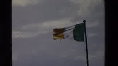Ireland (1969): Flag Blows In The Wind Over A Castle By A Lake