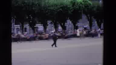 Loudes France (1969): Man Plays Bagpipe In The Street
