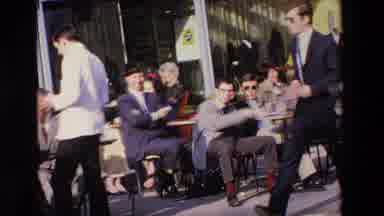 Loudes France (1969): Outdoor Cafe With People Watching Passer Byers