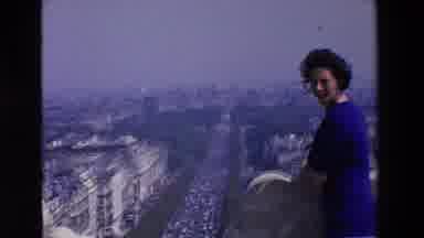 Loudes France (1969): Woman In Blue Dress Stands On Rooftop Overlooking City