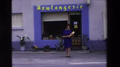 Loudes France (1969): Lady Walking Out Of Store