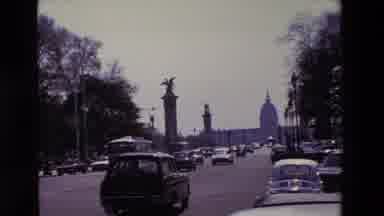 Paris France (1969): Cars Moving In Traffic Down City Street