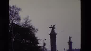 Paris France (1969): Winged Statue Atop A Pedestal With Another Statue Nearby