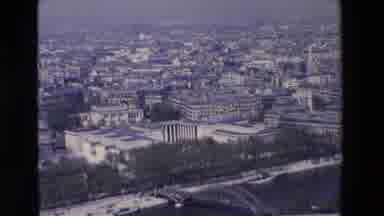 Paris France (1969): Aerial View Of A Large City With White Buildings Along A