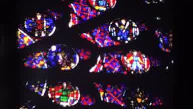 Paris France (1969): Stained Glass With Dark Lighting Depicting Various Religious