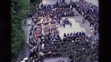 Paris France-1969: Large Crowd Gathering With Wheelchairs In Central Plaza