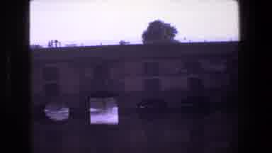 Strasburg France-1970: Historic Bridge And River Scene In Vintage 8mm Film