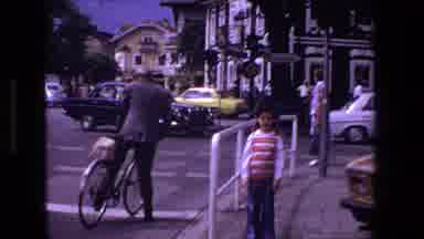 Strasburg France (1970): A Girl Poses On A Sidewalk Near A Busy Intersection