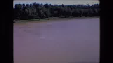 ALGERIA-1971: Crowds, Classic Cars, And A Vast Muddy River