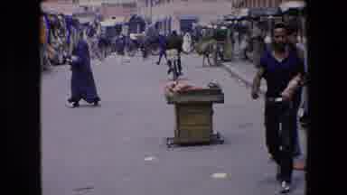 Algeria (1971): People Walking Through An Outdoor Bazaar