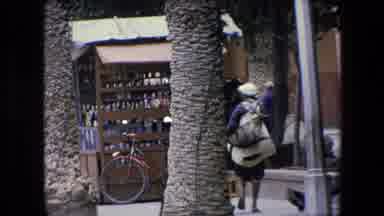 ALGERIA-1971: Businessman Gets Shoe Shine As Woman Walks Past