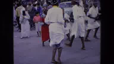 Algeria (1971): Men Dancing In The Street While People Stand And Watch