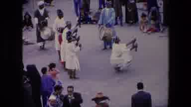 Algeria (1971): Muslim Males Dancing And Playing Instruments In A Crowd While