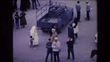 Algeria (1971): Women Wearing Burka Holding Their Kids Are Walking