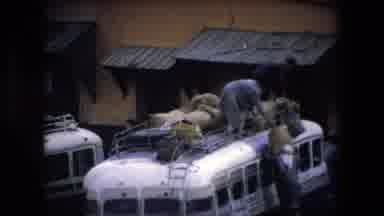 Algeria (1971): People On Top Of A Bus Looking For Bags