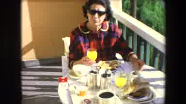 Algeria (1971): Woman Wearing Sunglasses Having Lunch At A Balcony