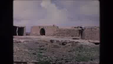 Algeria (1971): Remote Building In The Middle Eastern Dessert With Cobblestone