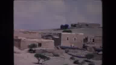 Algeria (1971): A Row Of Stone Houses In The Middle Of A Field