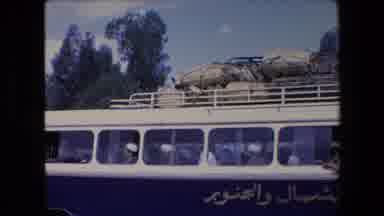 Algeria (1971): Luggage On Top Of Bus With Arabic Writing