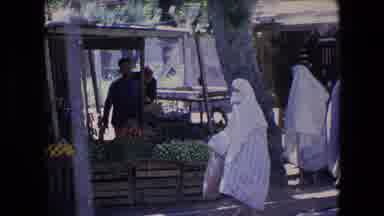 Algeria (1971): Muslim Woman Walking In A Shopping Area