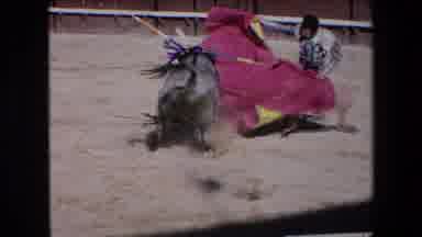 Barcelona Spain-1971: Vintage 8mm Bullfighting Footage of Matador with Red and Yellow Blanket