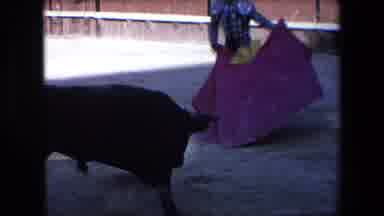 Barcelona Spain (1971): Bullfighter Attempts To Face An Angry Bull With Horns