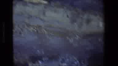 Tel Aviv Israel (1972): White Brick Building Pans To Rugged Mountains And A Valley