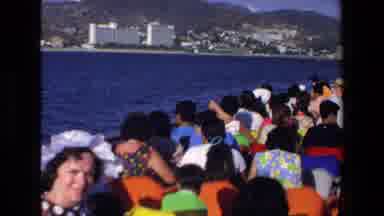 Mazatlan Mexico (1972): A Bunch Of People On A Boat Looking Out Towards The Water