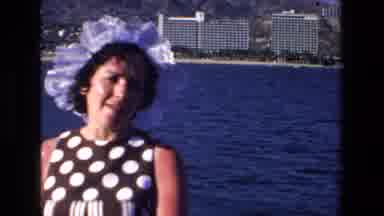 Mazatlan Mexico (1972): A Woman In A White Bonnet Is Talking In Front Of The Ocean