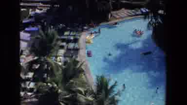 Mazatlan Mexico (1972): People Swimming In A Pool Then A Parachuting Person