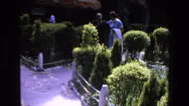Mazatlan Mexico (1972): Two People Walking Through The Garden Together