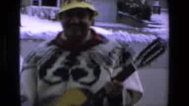 Mazatlan Mexico (1972): A Man With An Instrument Outside The House