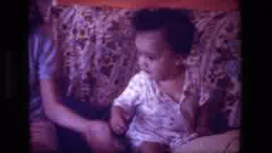 Hollywood California USA (1981): Older Sisters Play With Baby Sibling On And Near