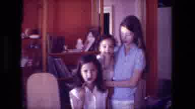 Hollywood California USA (1981): Woman, Kids, Girl, Baby, Books, Book Shelf, Wall,