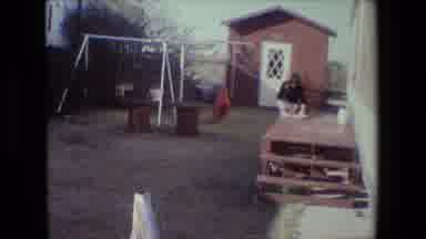 Lansing Michigan (1981): A Woman Guiding A Child Into The Backyard
