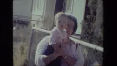 Lansing Michigan (1981): Grey Haired Woman Holding Cute Infant